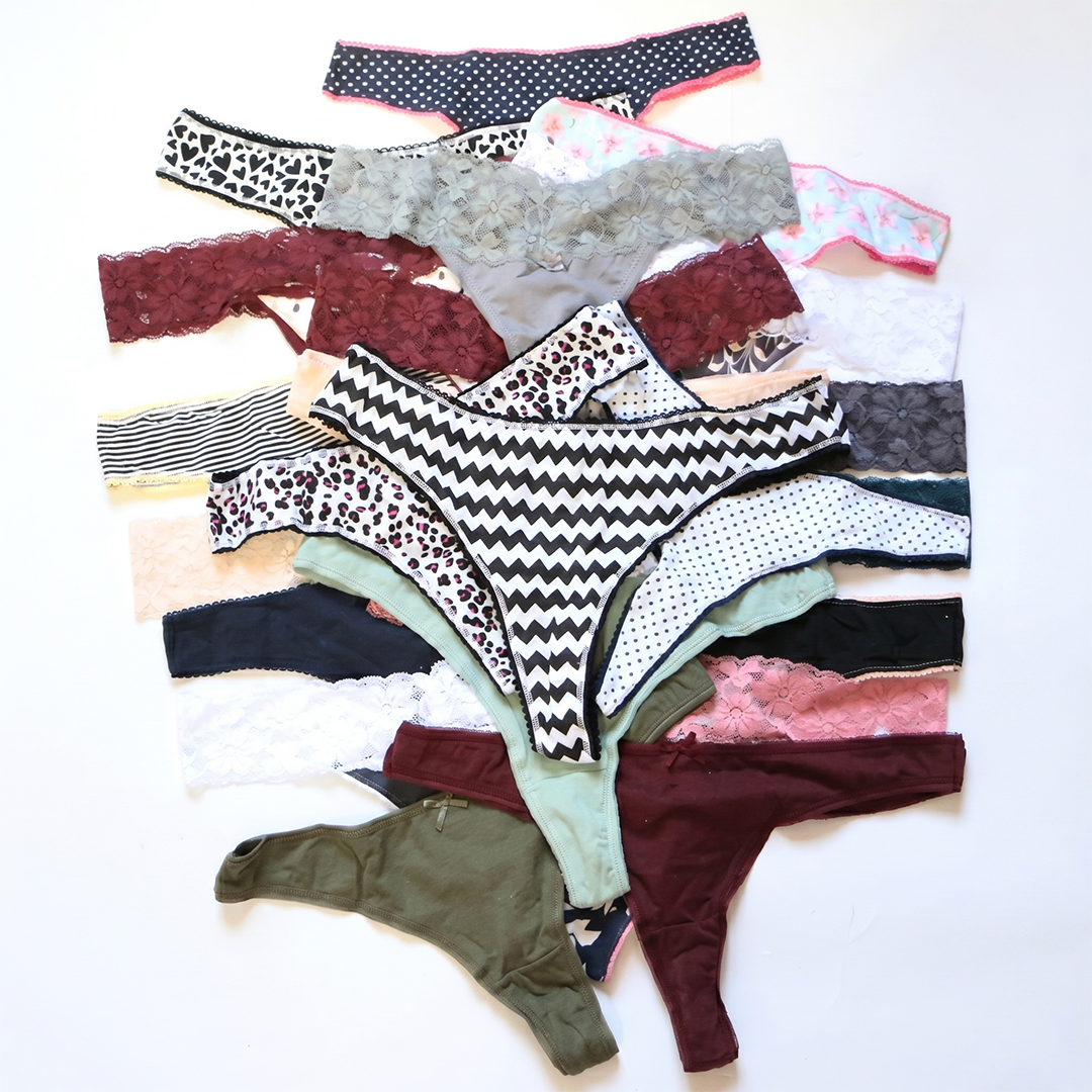 Assorted women's underwear in various patterns and colors on a white background