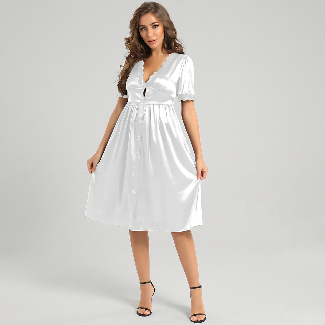 Woman wearing a white dress on a gray background