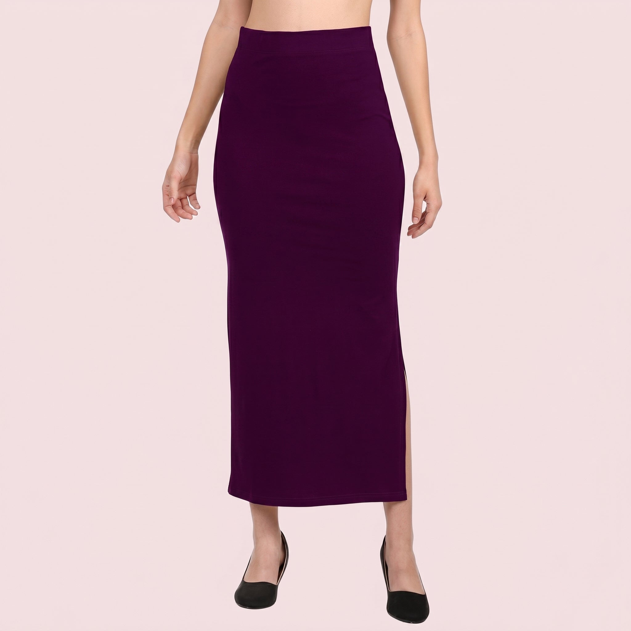 Purple pencil skirt worn by a person on a light pink background