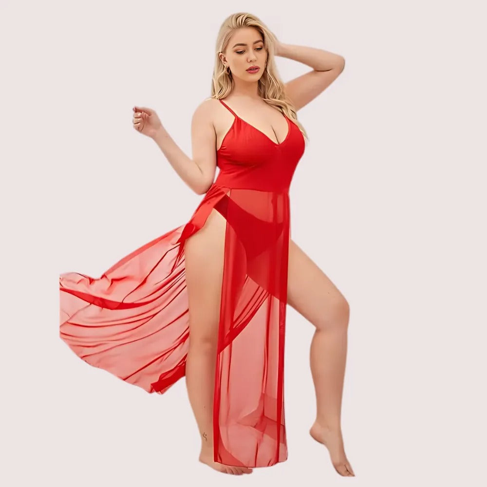 Woman wearing a red sheer dress on a light pink background