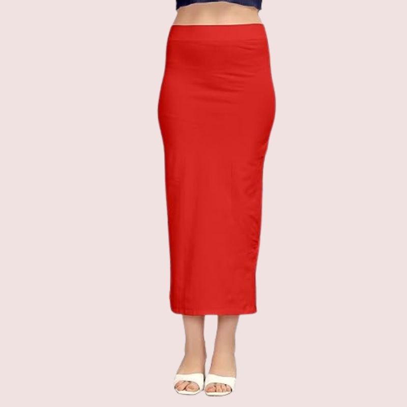 Red pencil skirt worn by a person on a light pink background