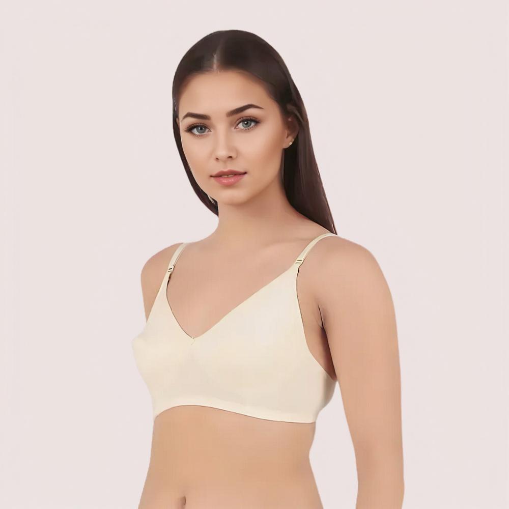 Woman wearing a beige bralette 