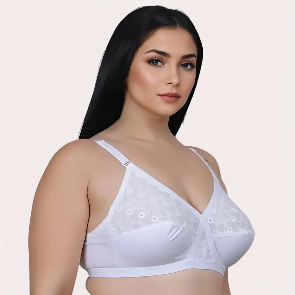 Woman wearing a white bra with lace details 