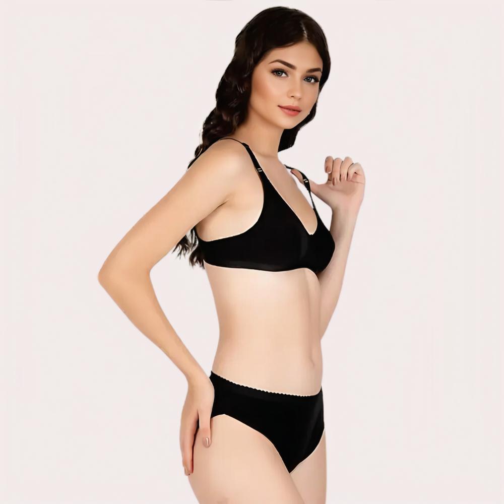 Woman wearing a black bra and panties set 
