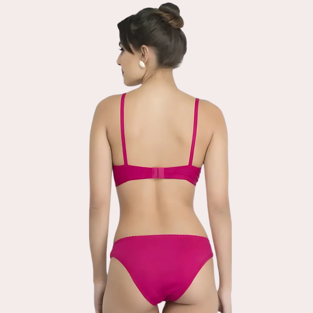 Woman wearing a magenta bikini back side