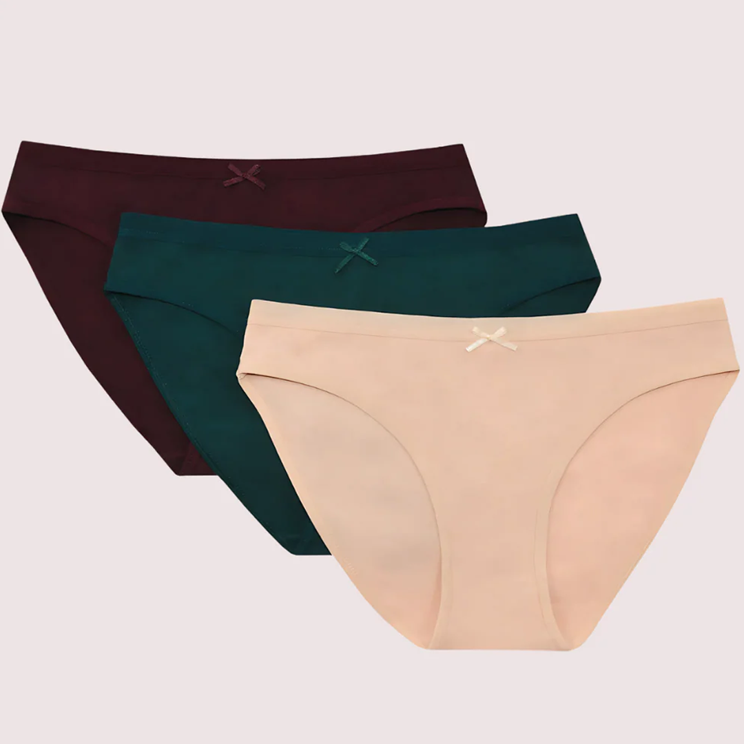 Three pairs of women's underwear in maroon, green, and beige on a light gray background.