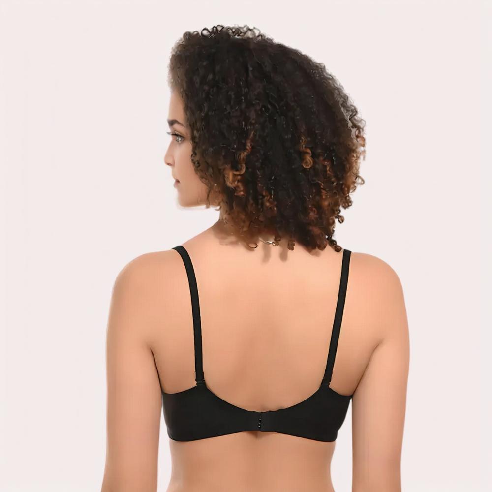 Woman wearing a black bra back side