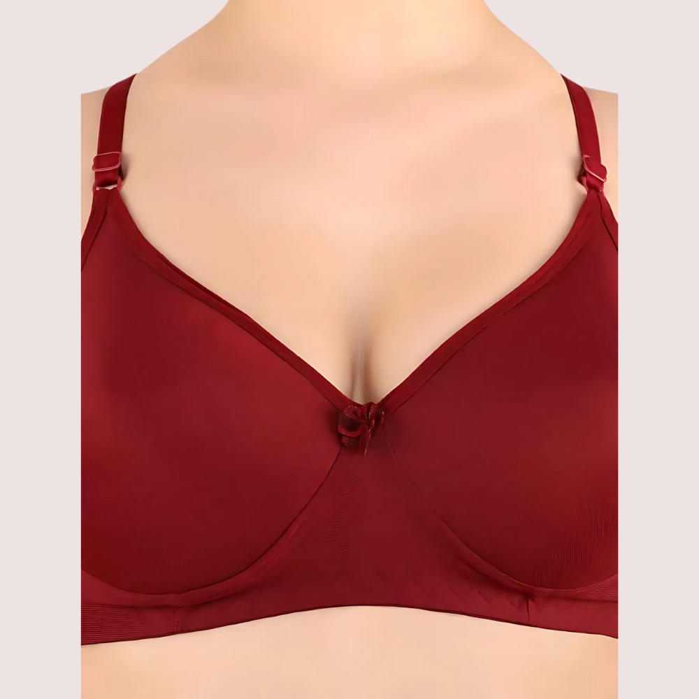 Red bra on a mannequin against a light gray background