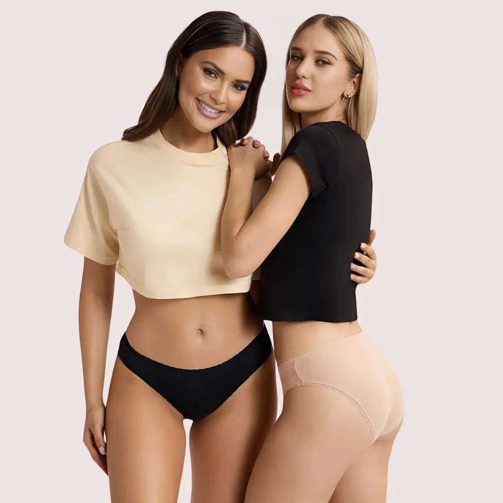 Two women wearing black and beige undergarments on a plain background