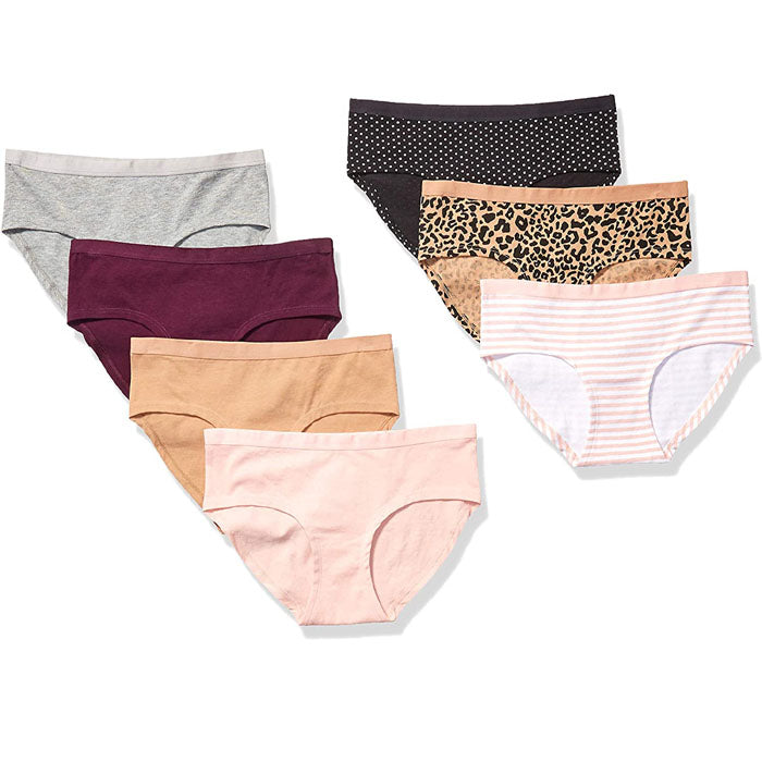 Set of women's underwear in various colors and patterns on a white background